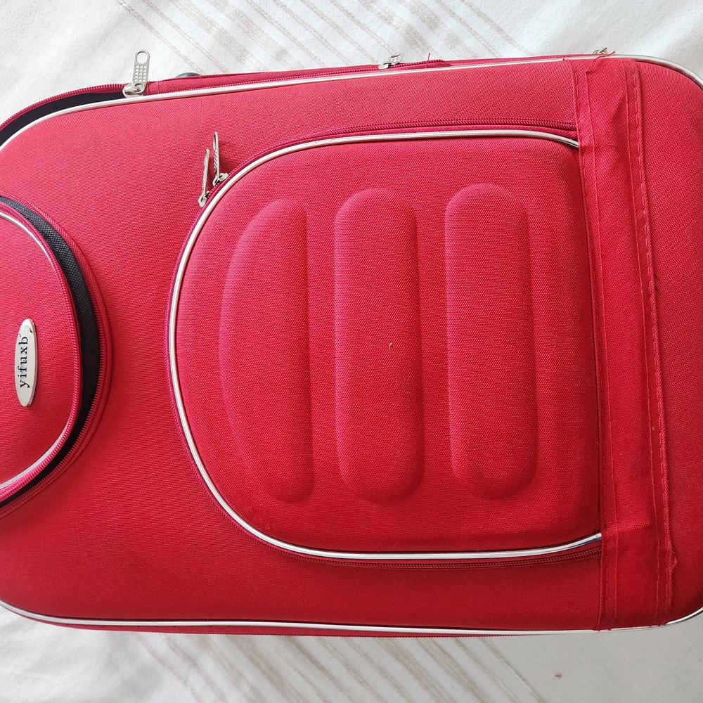 Red Suitcase with Silver Accents
